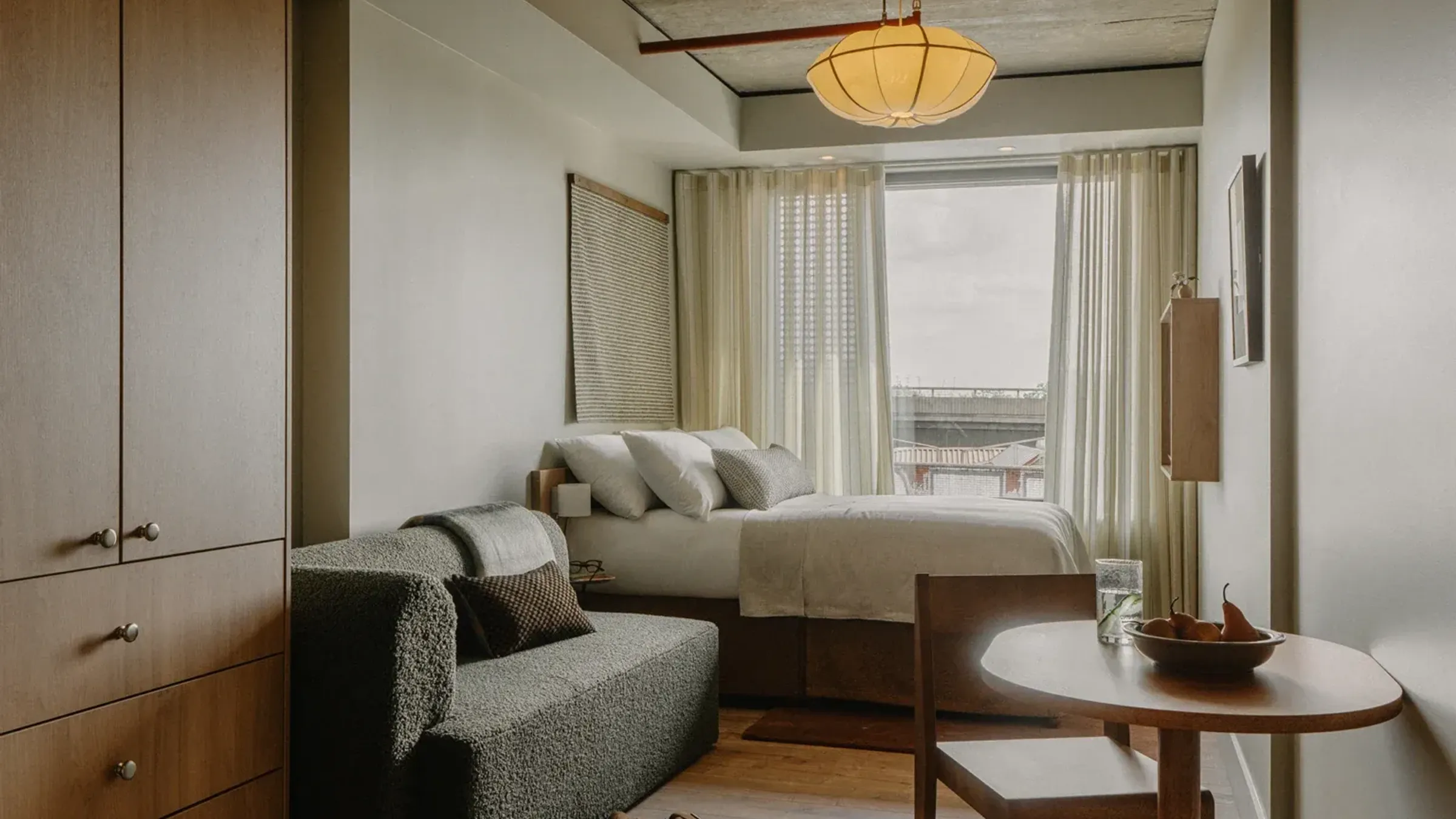 a room with a bed and a couch
