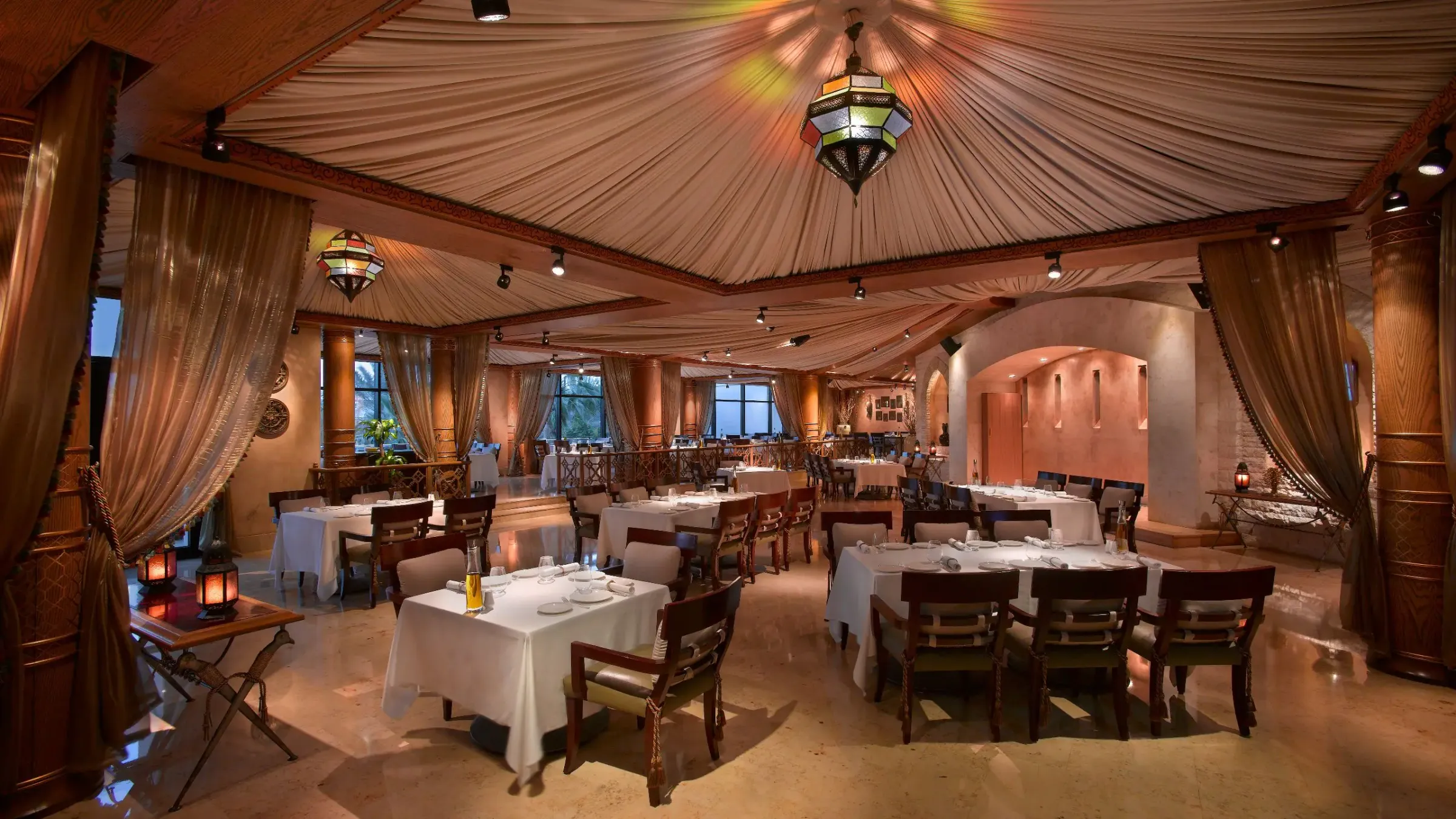 a room with tables and chairs