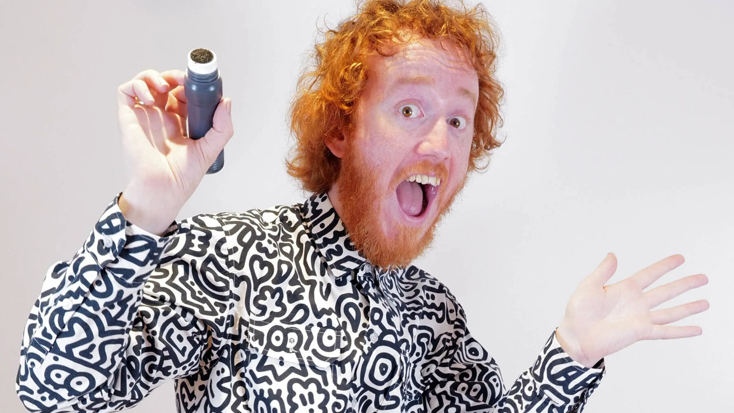 a man holding a microphone