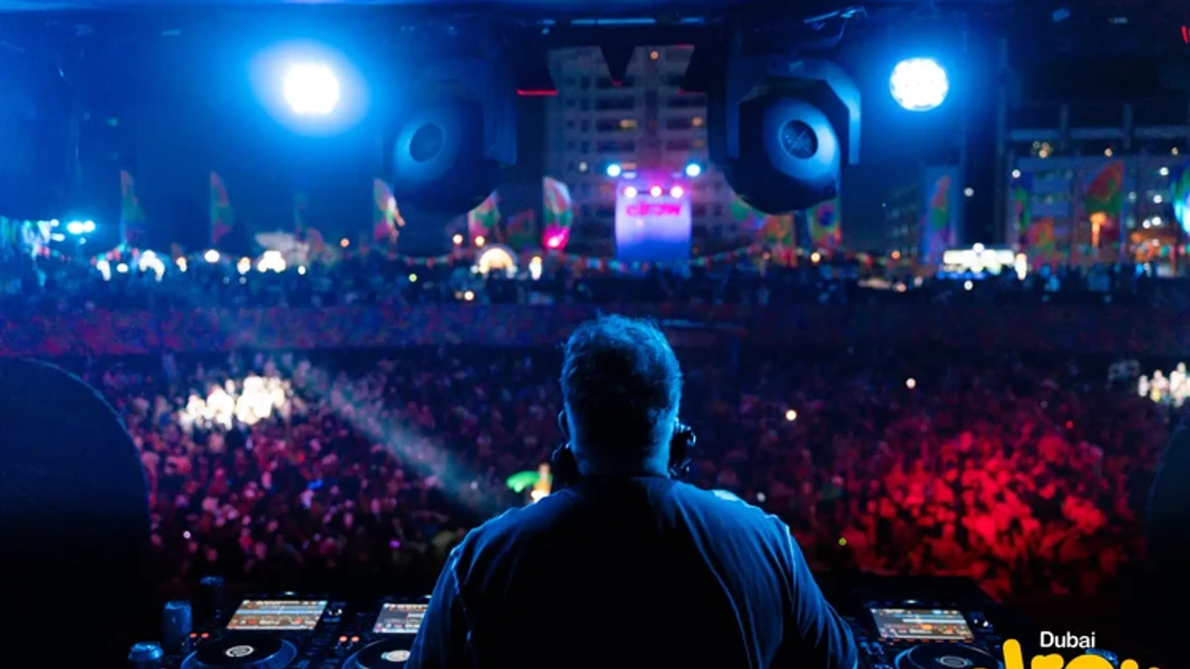 a man standing in front of a large crowd