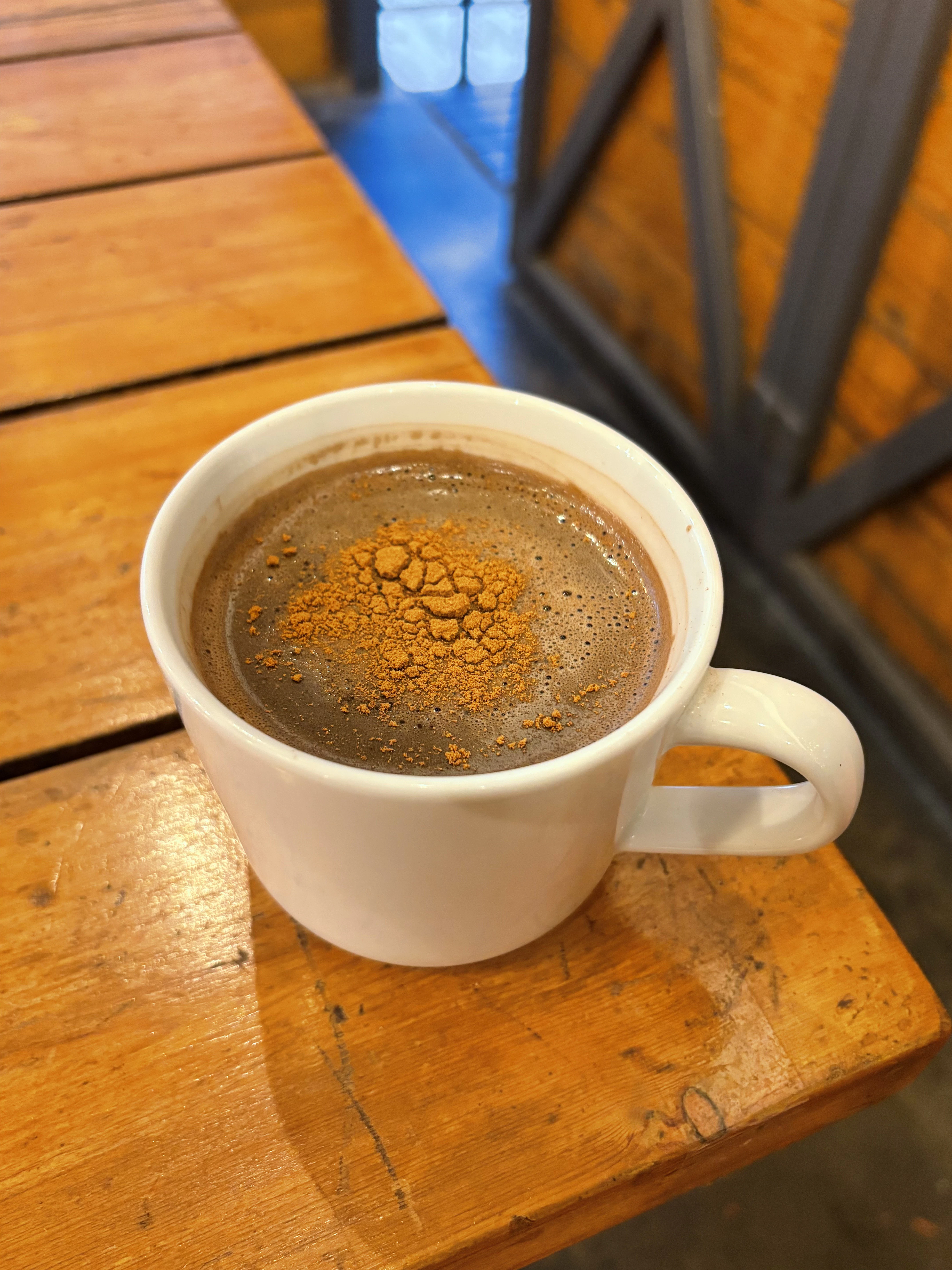 a cup of coffee on a table