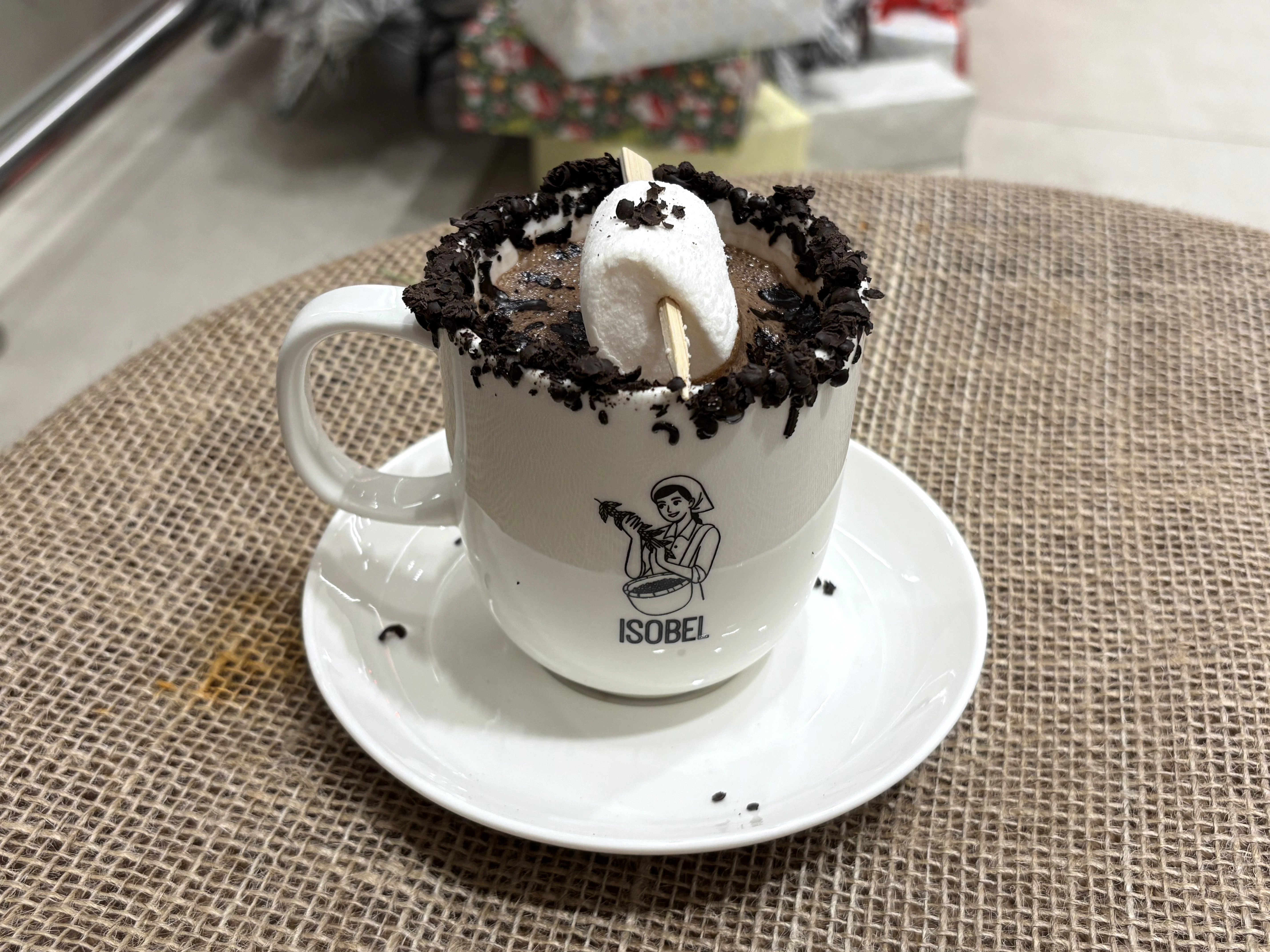 a cup of hot chocolate with a marshmallow on top