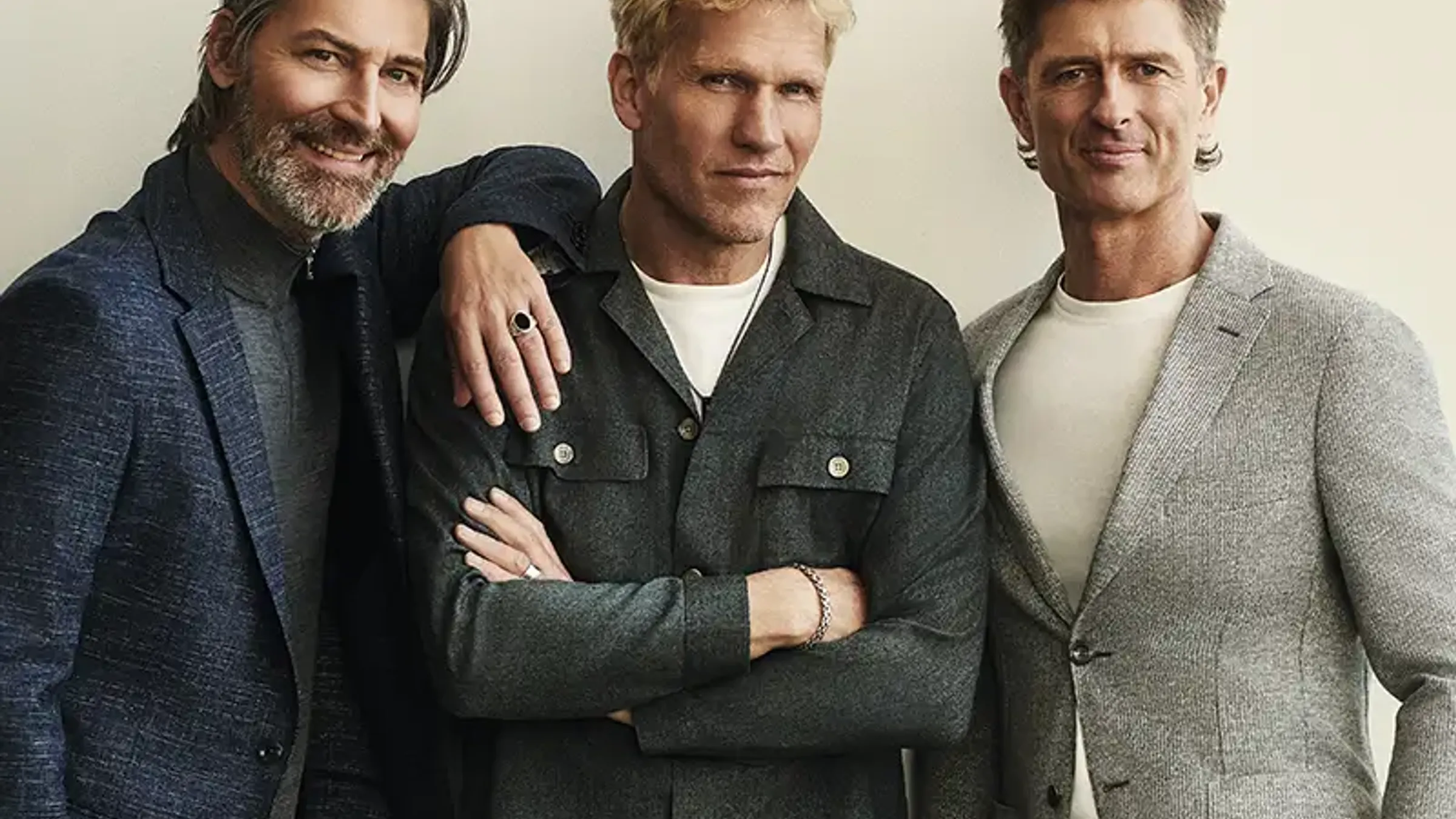 a group of men posing for a picture